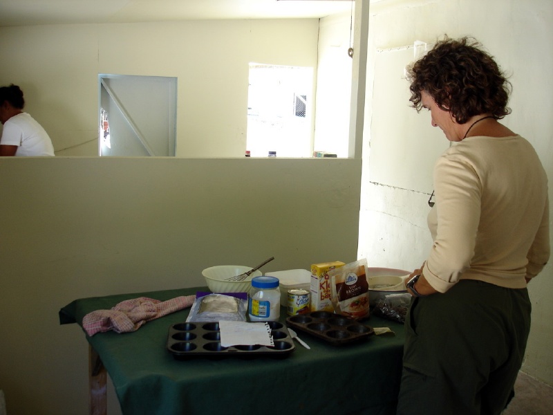 Jenny helps making chocolate chip cookies in their home.